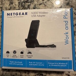 netgear black and blue N300 Wireless USB Adapter with Stand
